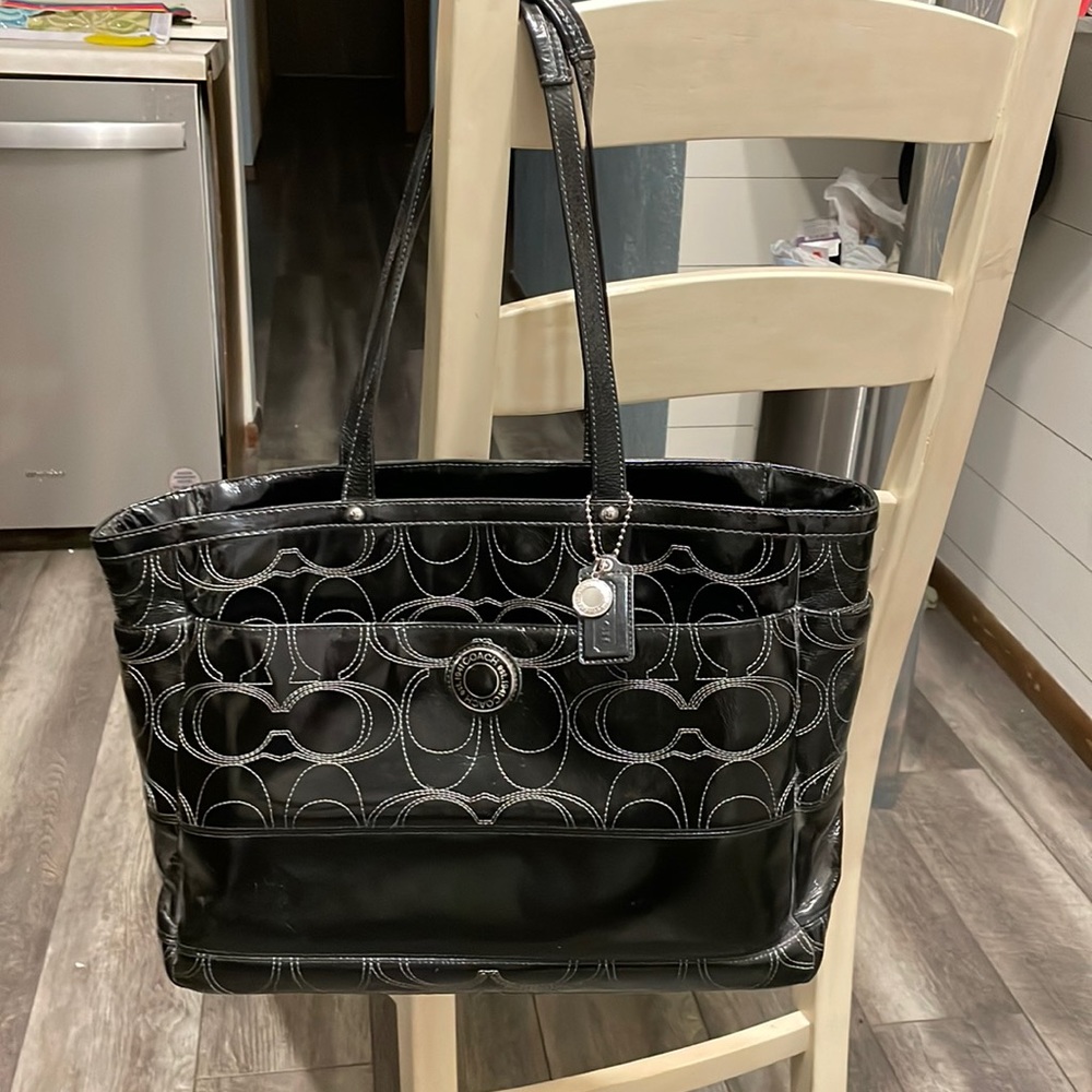 Selling a Coach diaper bag with changing pad